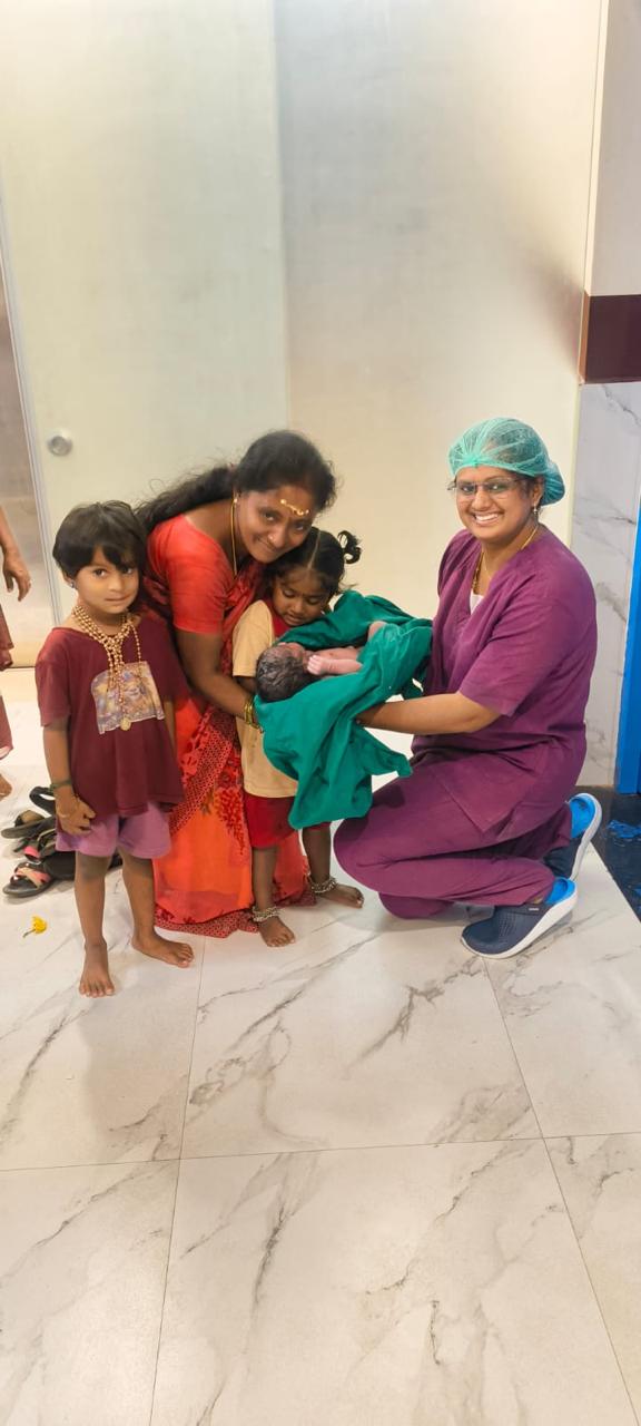 Siblings welcoming their newborn at Sri Sai Clinic & Scans