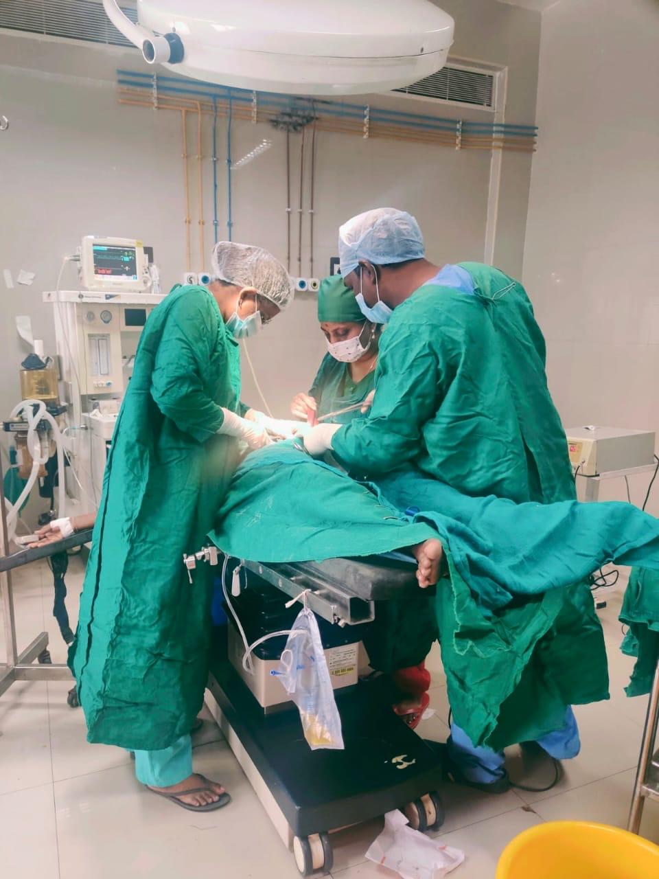 Dr. M. Srija and her surgical team performing a procedure at Sri Sai Clinic & Scans